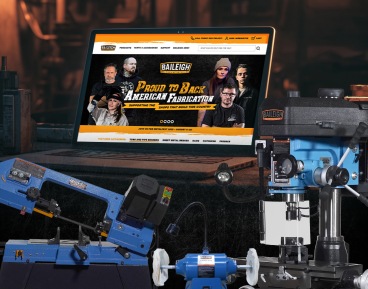 Our new website on a laptop in a workshop